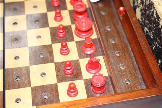A late 19th century Jaques, London Travelling In Statu Quo travelling chess set, the original leather case containing a boxwood
